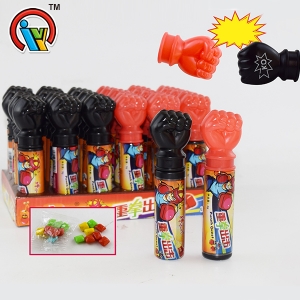 Toy fist with bubble gum